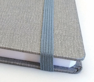 NOTES RIO MINI A6 BEŽ  TK  šivani poslovni  11*15cm  96 listova s lastikom Ogi *